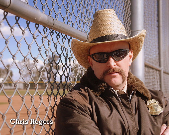 Chris Rogers Sheriff chainlink fence