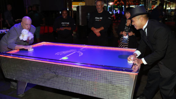 Dr Evil Blofeld Principal Tintri playing airhockey